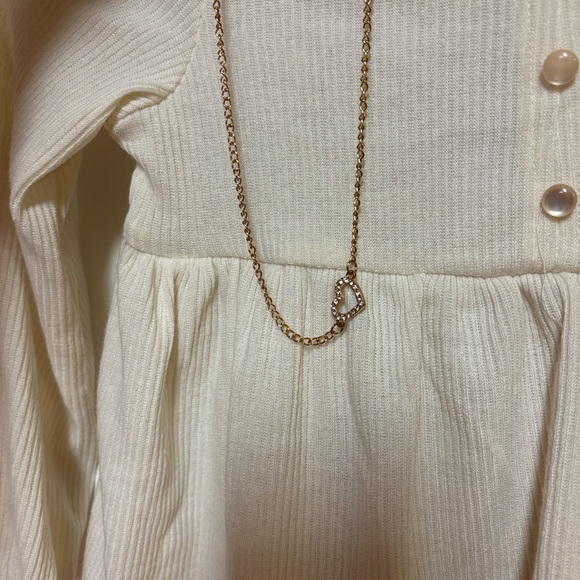 Ivory Ribbed Knit Top and Patterned Ruffle Leg Pants - Picture 2 of 6